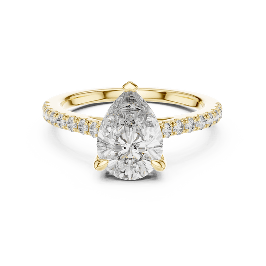 Gold engagement ring with side stones and large center diamond